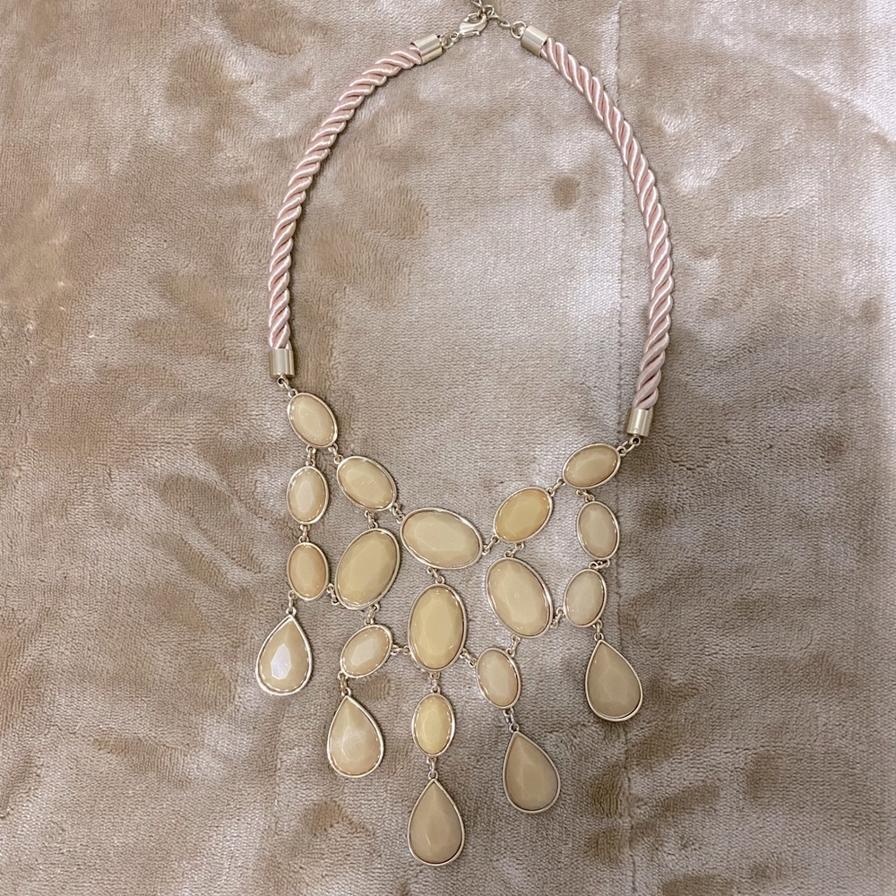 Eye catching, one of a kind neckline beauty.